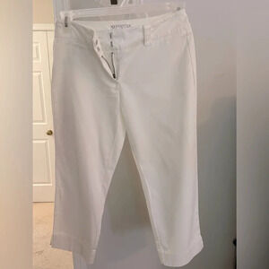 Chino NY white low rise size 2 capris. Side Slit at hem w/2 back pockets 1 front